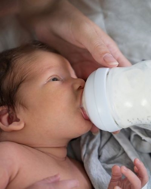 Bottle Feed Baby Shutterstock 2378252985